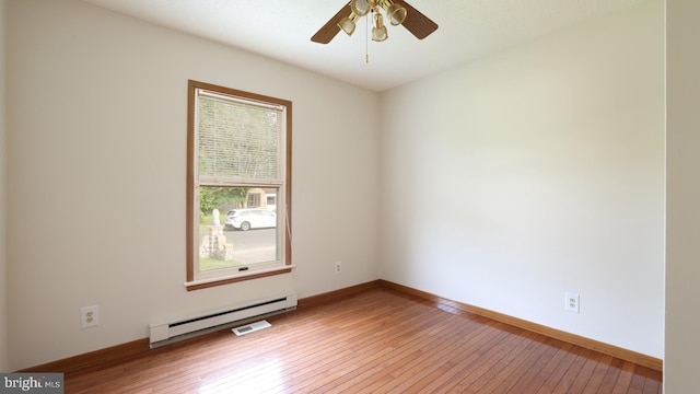 45 Wert Ave, Hamilton, NJ 08610 - empty room with a baseboard heating unit, light wood-style floors, and a ceiling fan