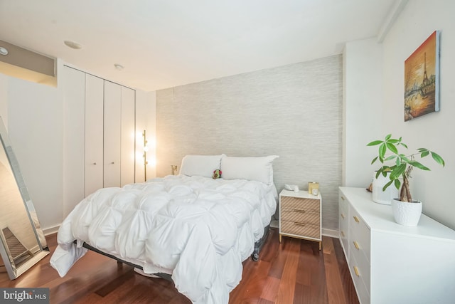 219 S 18th St Unit 1522, Philadelphia, PA 19103 - bedroom with dark wood finished floors and a closet
