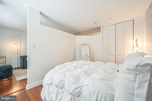 219 S 18th St Unit 1522, Philadelphia, PA 19103 - bedroom with wood finished floors and baseboards