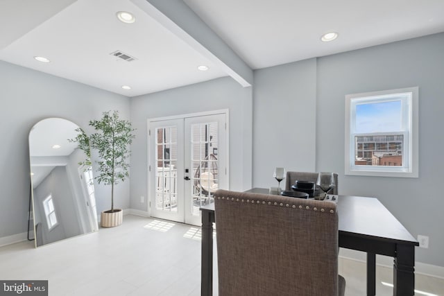 706 Longfellow St NW, Washington, DC 20011 - entrance foyer featuring french doors, recessed lighting, and wood finished floors