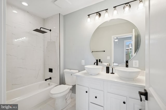 706 Longfellow St NW, Washington, DC 20011 - bathroom with double vanity, marble finish floors, and shower / bathtub combination