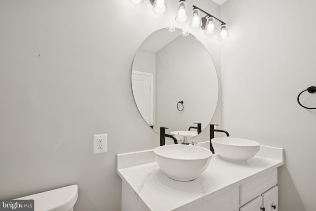706 Longfellow St NW, Washington, DC 20011 - bathroom with double vanity and toilet