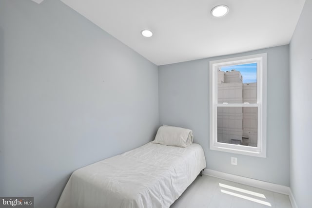 706 Longfellow St NW, Washington, DC 20011 - tiled bedroom featuring baseboards