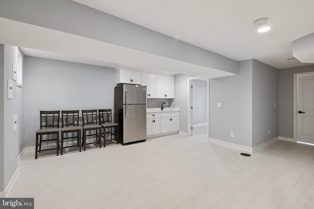 706 Longfellow St NW, Washington, DC 20011 - finished basement with freestanding refrigerator and bar area