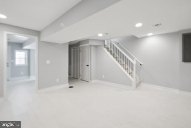 706 Longfellow St NW, Washington, DC 20011 - basement featuring recessed lighting, stairs, and carpet floors
