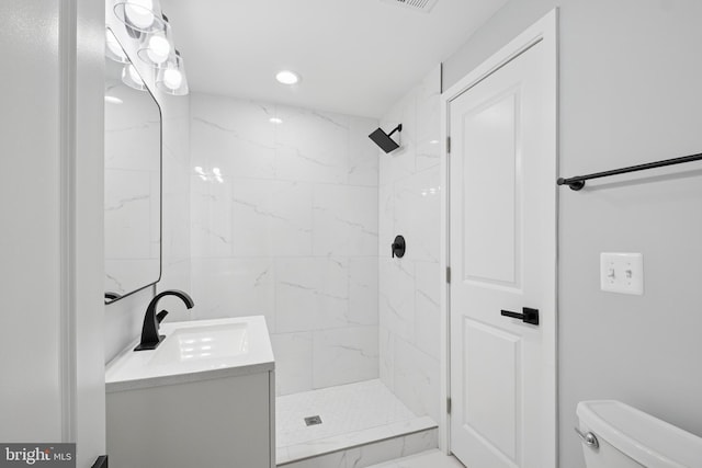 706 Longfellow St NW, Washington, DC 20011 - full bath featuring vanity, a tile shower, and recessed lighting