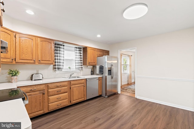 2108 Weatherton Dr, Wilmington, DE 19810 - kitchen featuring appliances with stainless steel finishes, wood finished floors, recessed lighting, and light countertops