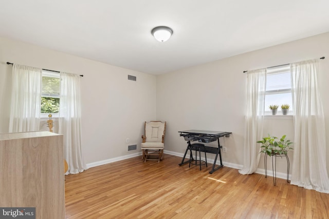 2108 Weatherton Dr, Wilmington, DE 19810 - living area with light wood-type flooring and baseboards