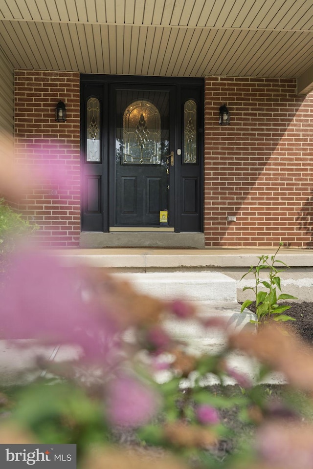 2108 Weatherton Dr, Wilmington, DE 19810 - view of exterior entry with brick siding and covered porch