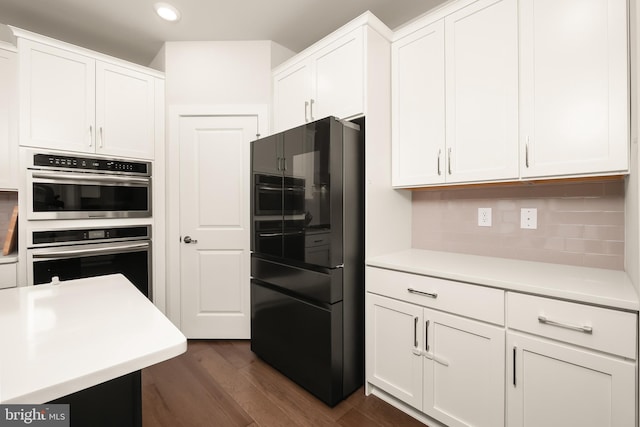 5635 Saucon Ridge Rd, Coopersburg, PA 18036 - kitchen featuring freestanding refrigerator, dark wood-style floors, recessed lighting, double oven, and light countertops
