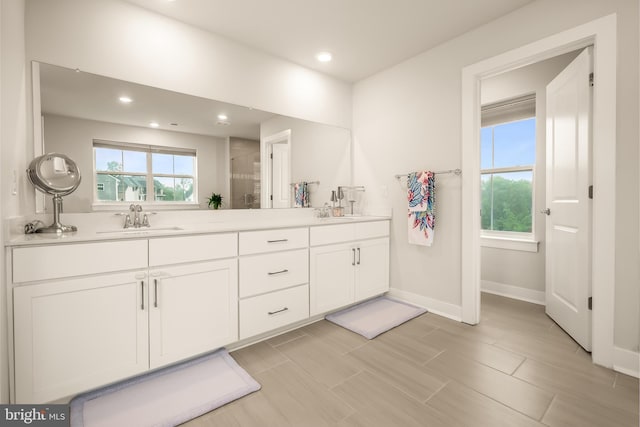 5635 Saucon Ridge Rd, Coopersburg, PA 18036 - bathroom featuring double vanity, recessed lighting, a shower, and wood tiled floors