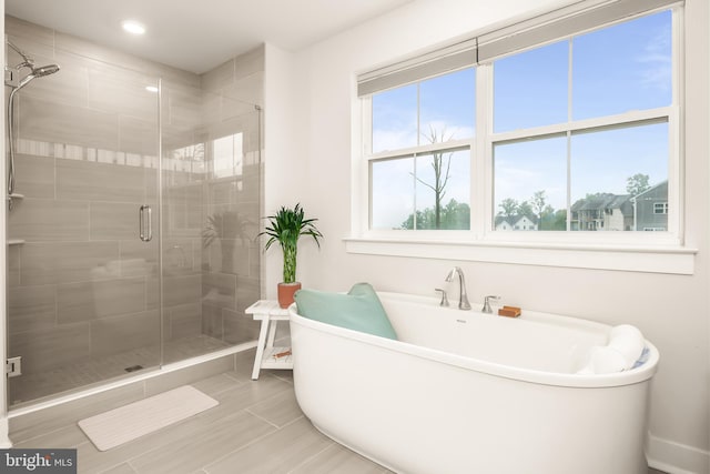 5635 Saucon Ridge Rd, Coopersburg, PA 18036 - bathroom with a soaking tub, a stall shower, and recessed lighting
