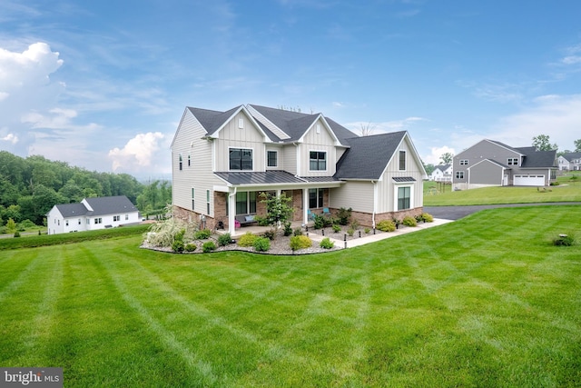 5635 Saucon Ridge Rd, Coopersburg, PA 18036 - modern farmhouse with board and batten siding, a standing seam roof, a porch, and a front lawn