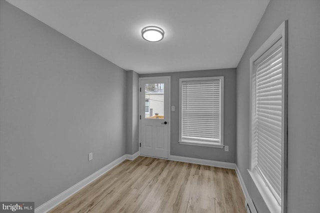 446 S 15th St, Reading, PA 19602 - foyer featuring baseboards and wood finished floors