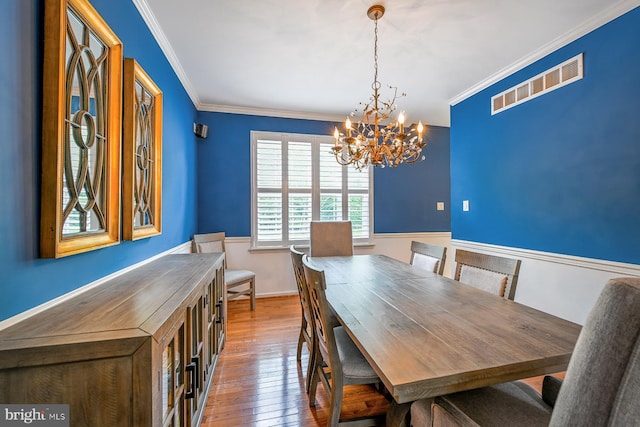 1506 Cloverhill Rd, Pottstown, PA 19464 - dining space featuring a chandelier, hardwood / wood-style floors, and ornamental molding
