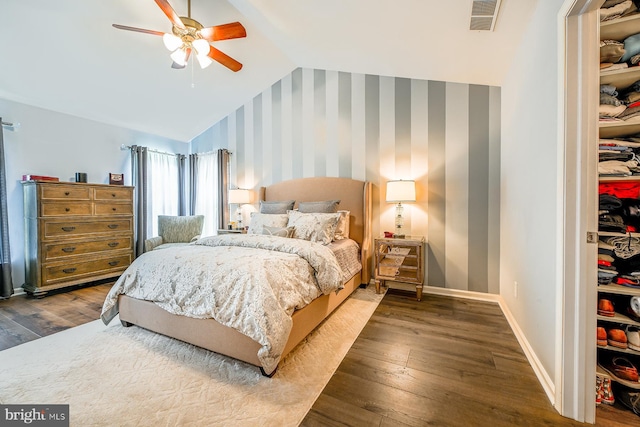 1506 Cloverhill Rd, Pottstown, PA 19464 - bedroom with lofted ceiling, wallpapered walls, wood-type flooring, a closet, and a ceiling fan