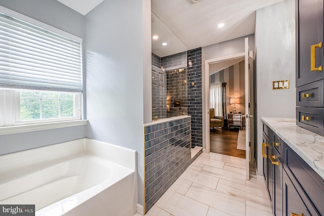 1506 Cloverhill Rd, Pottstown, PA 19464 - bathroom featuring a walk in shower, a garden tub, vanity, marble finish flooring, and recessed lighting