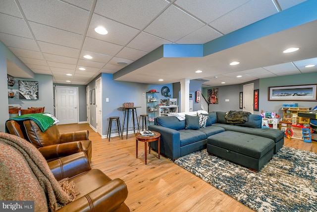1506 Cloverhill Rd, Pottstown, PA 19464 - living room with a drop ceiling, wood finished floors, recessed lighting, and decorative columns