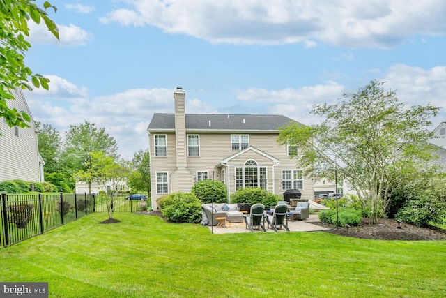 1506 Cloverhill Rd, Pottstown, PA 19464 - back of house with a patio, an outdoor living space, and a chimney