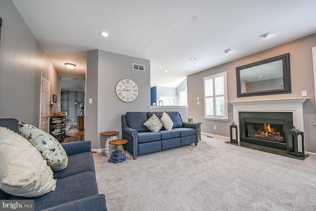 1506 Cloverhill Rd, Pottstown, PA 19464 - carpeted living area featuring a fireplace with flush hearth and recessed lighting