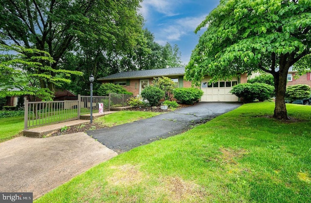 2170 Reading Blvd, Reading, PA 19609 - view of front facade featuring a garage, driveway, and brick siding
