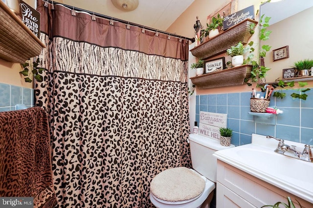 2170 Reading Blvd, Reading, PA 19609 - full bathroom featuring vanity, tile walls, and a shower with shower curtain