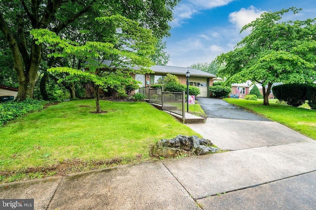 2170 Reading Blvd, Reading, PA 19609 - ranch-style house featuring driveway and an attached garage