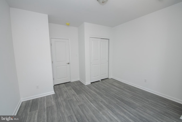 1615 Rowan St, Philadelphia, PA 19140 - unfurnished bedroom featuring dark wood-style floors and a closet
