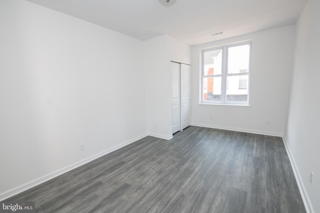 1615 Rowan St, Philadelphia, PA 19140 - unfurnished room featuring dark wood-type flooring and baseboards