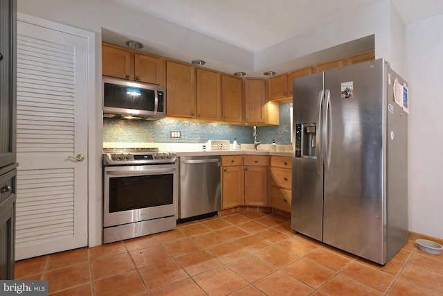 20B Oscar Hammerstein Way Unit 20B, New Hope, PA 18938 - kitchen featuring stainless steel appliances, light tile patterned floors, and light countertops