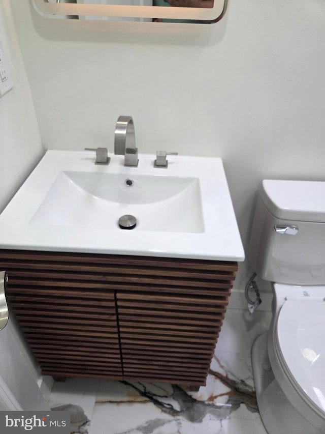 1473 Stevens St, Philadelphia, PA 19149 - half bathroom with marble look tiles and vanity