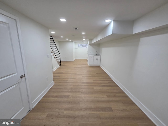 1473 Stevens St, Philadelphia, PA 19149 - finished basement with recessed lighting, stairs, and light wood-type flooring