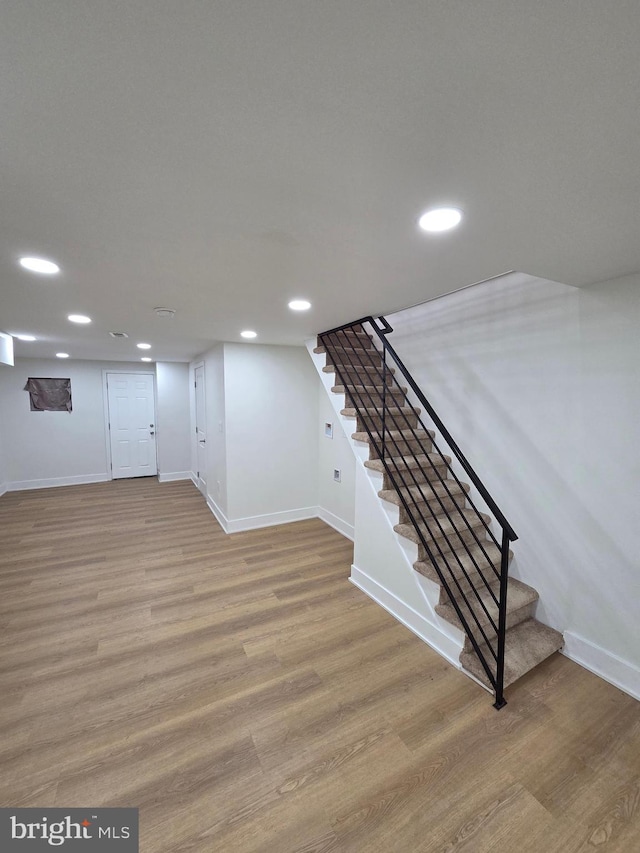 1473 Stevens St, Philadelphia, PA 19149 - finished below grade area featuring stairs, wood finished floors, and recessed lighting