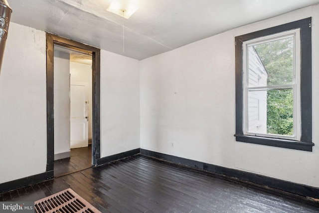 111/2 College Ave, Annapolis, MD 21401 - empty room with dark wood-type flooring and baseboards