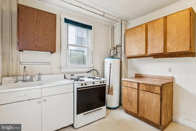 111/2 College Ave, Annapolis, MD 21401 - kitchen with white gas range oven, gas water heater, light countertops, and brown cabinetry