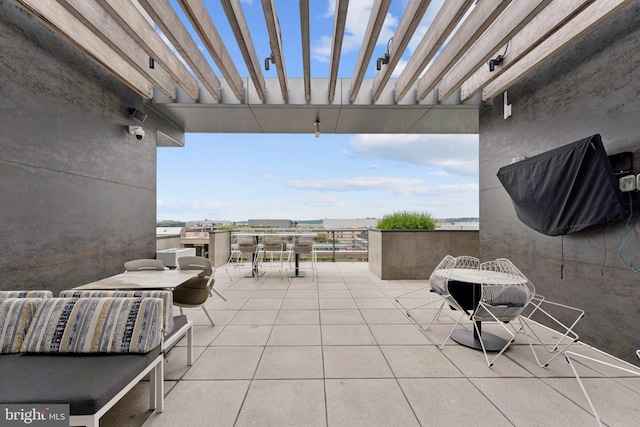1211 Van St SE Unit 913, Washington, DC 20003 - view of patio / terrace with a pergola and outdoor dining area