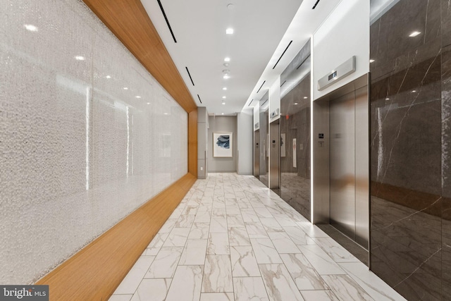 1211 Van St SE Unit 913, Washington, DC 20003 - hall with light marble finish flooring and elevator