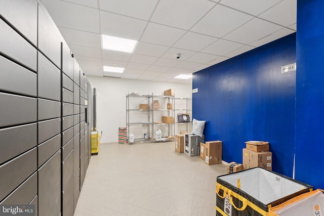 1211 Van St SE Unit 913, Washington, DC 20003 - miscellaneous room with a drop ceiling and a package area