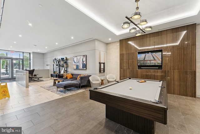 1211 Van St SE Unit 913, Washington, DC 20003 - recreation room featuring floor to ceiling windows, billiards table, recessed lighting, and a chandelier