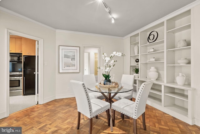 2500 Q St NW Unit 545, Washington, DC 20007 - dining area with crown molding and rail lighting