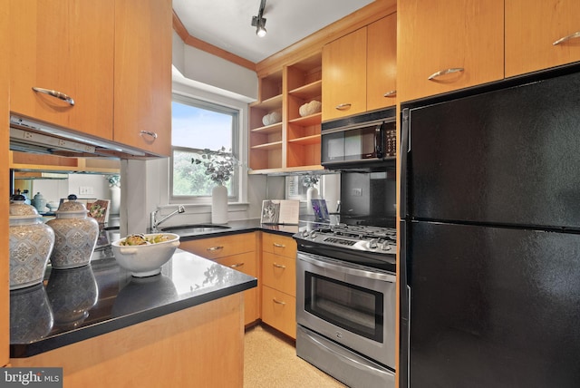 2500 Q St NW Unit 545, Washington, DC 20007 - kitchen with black appliances, open shelves, dark countertops, and track lighting