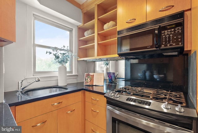 2500 Q St NW Unit 545, Washington, DC 20007 - kitchen with stainless steel range with gas stovetop, black microwave, open shelves, and dark stone countertops