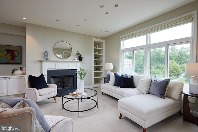 2801 Connecticut Ave NW Unit 32, Washington, DC 20008 - living room featuring a fireplace, built in shelves, recessed lighting, and carpet flooring