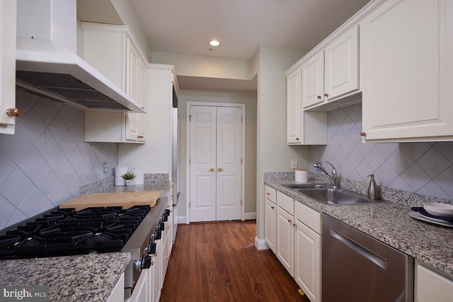 2801 Connecticut Ave NW Unit 32, Washington, DC 20008 - kitchen with premium range hood, stainless steel dishwasher, gas stovetop, tasteful backsplash, and white cabinets