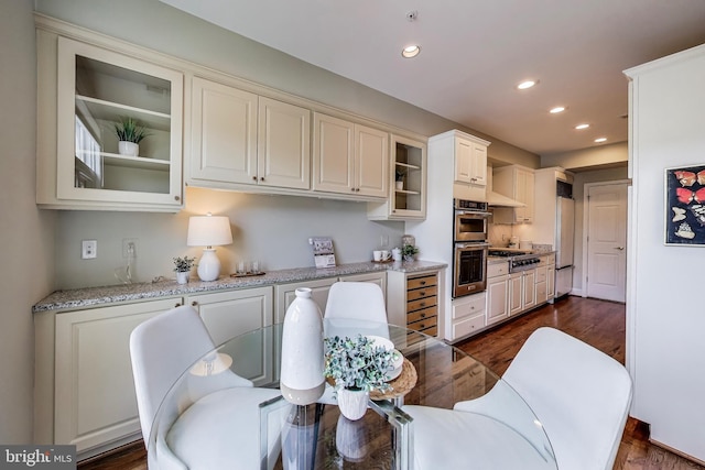 2801 Connecticut Ave NW Unit 32, Washington, DC 20008 - dining area with recessed lighting and dark wood finished floors