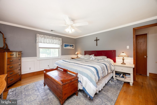4 Concord Way, Chadds Ford, PA 19317 - bedroom featuring wood finished floors, ornamental molding, wainscoting, and a ceiling fan
