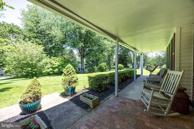 4 Concord Way, Chadds Ford, PA 19317 - covered porch with a yard and view of scattered trees