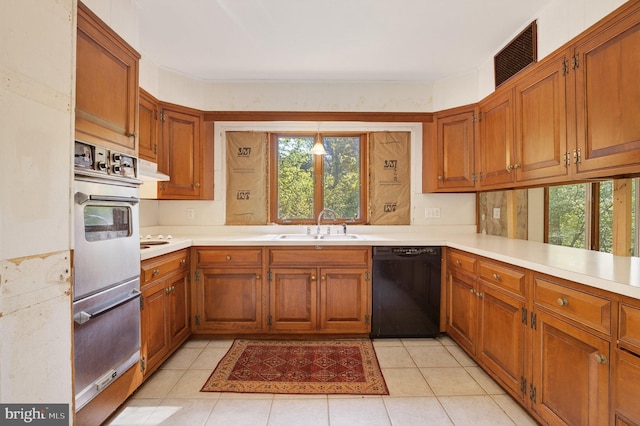 20 Birch Ct, Lancaster, PA 17603 - kitchen featuring black dishwasher, light countertops, and brown cabinets