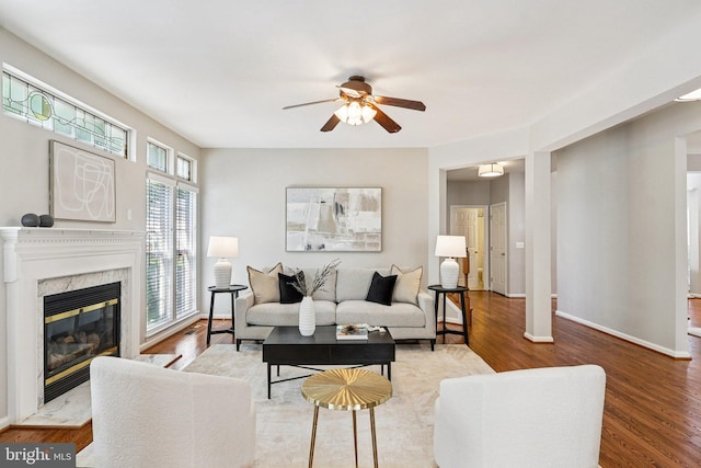 5570 La Vista Dr, Alexandria, VA 22310 - living room featuring a ceiling fan, wood finished floors, and a high end fireplace