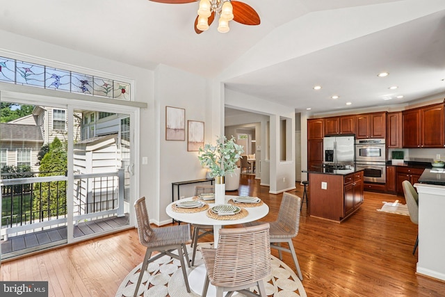 5570 La Vista Dr, Alexandria, VA 22310 - dining room with vaulted ceiling, a ceiling fan, hardwood / wood-style floors, and recessed lighting